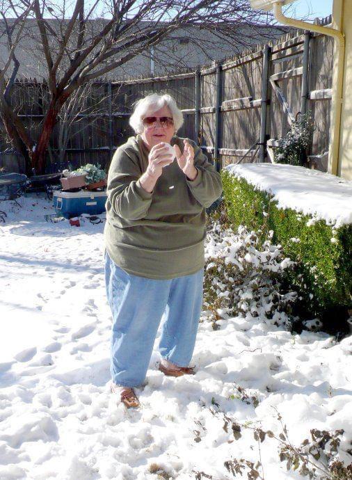 A woman standing in the snow