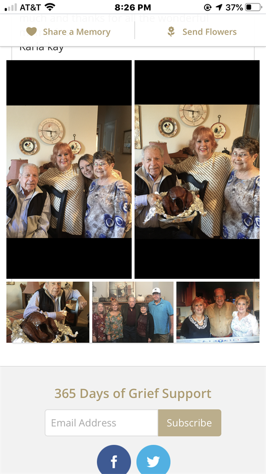 A family shares smiles as they pose with a beautifully roasted turkey during a festive gathering.