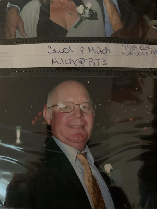 Family and friends celebrate a special occasion, sharing laughter and joy in a warm atmosphere.