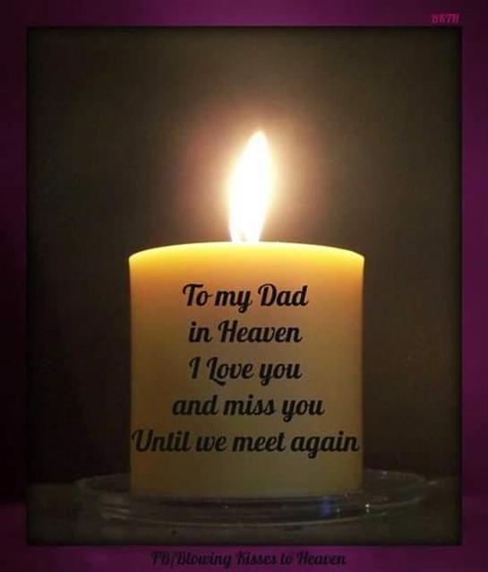 A lit candle with a touching message for a father, symbolizing love and remembrance.