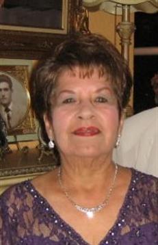 Elegant woman joyfully celebrates with family in a warm, memory-filled atmosphere.