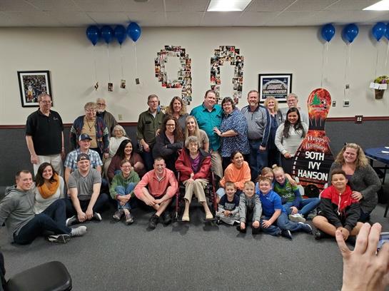 Family and friends come together to celebrate Ivy Hanson's 90th birthday with laughter and joy.