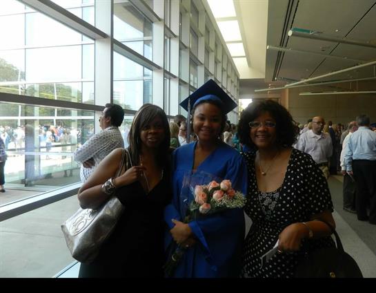 A joyful graduation celebration takes place with friends and family gathered to honor a graduate.