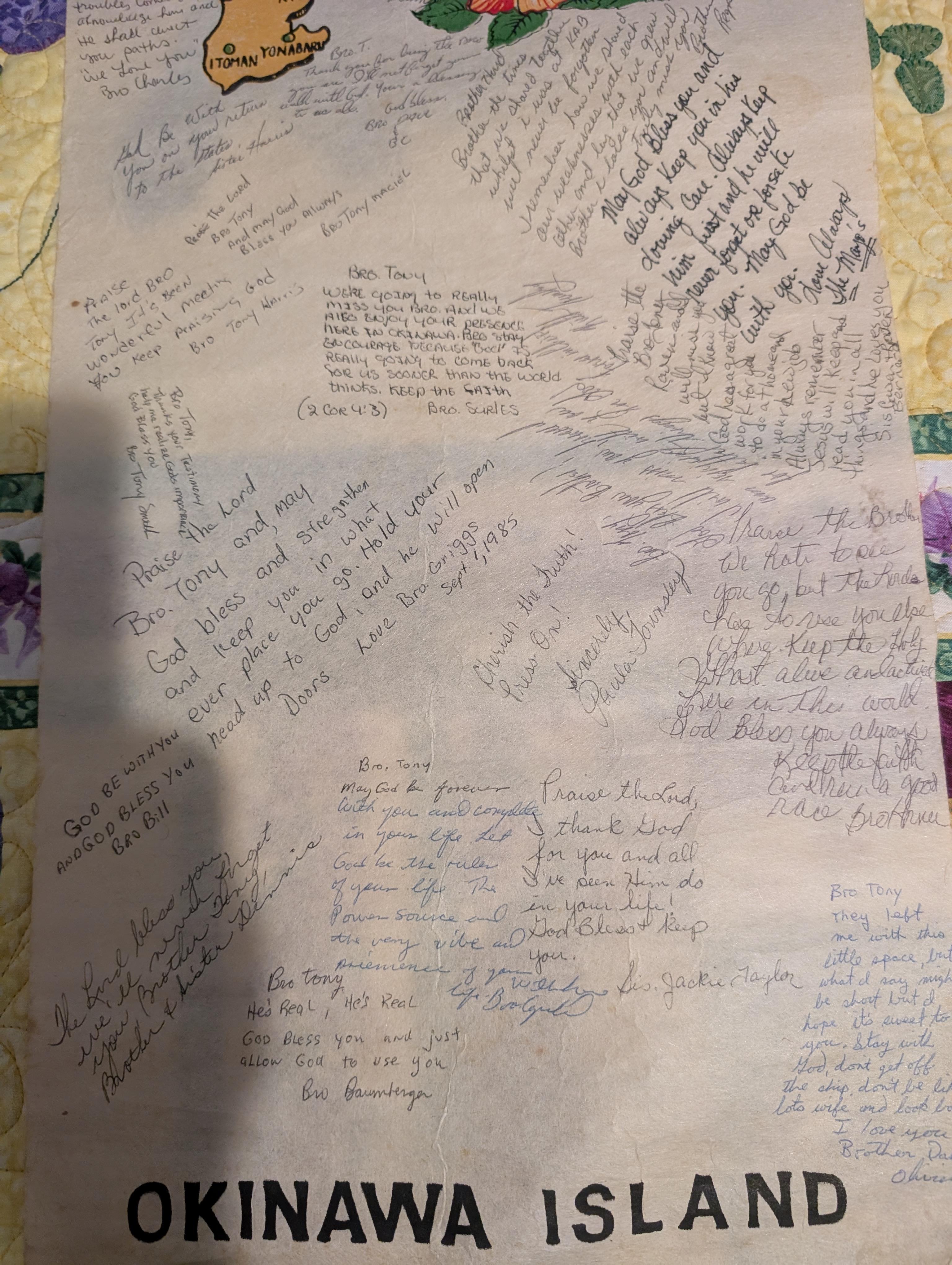 Handwritten notes in a keepsake from Okinawa Island reflect memories and gratitude.
