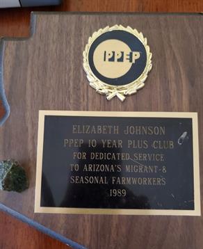Elizabeth Johnson received a recognition award for her decade of dedicated service in 1989.