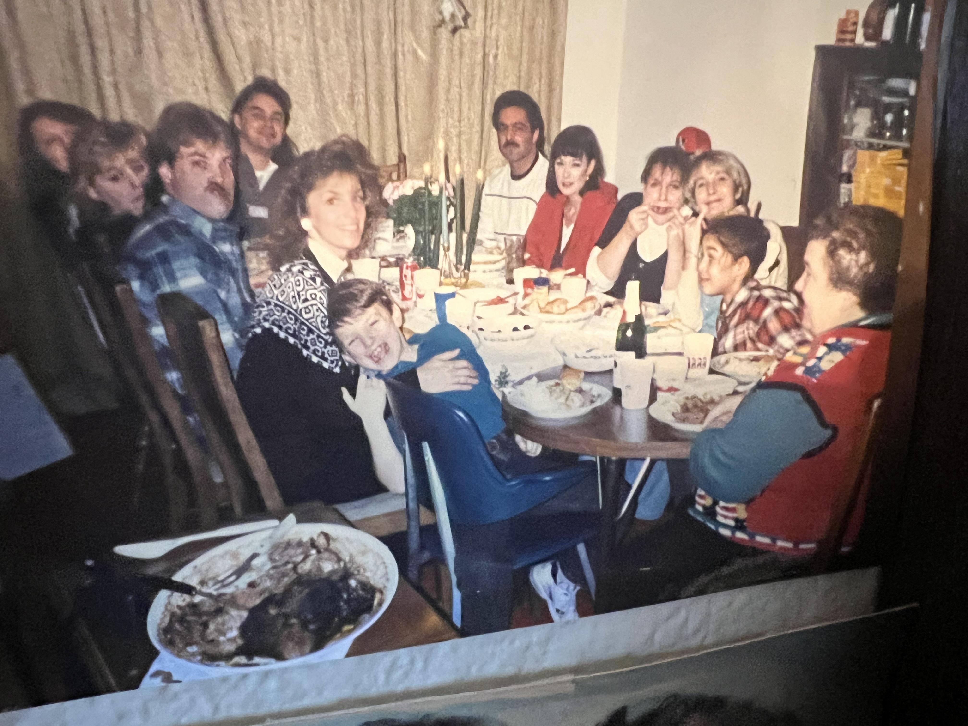 A group of people sitting around a table