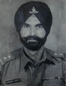 Soldier wearing a uniform and turban exudes confidence and pride, embodying duty and honor.