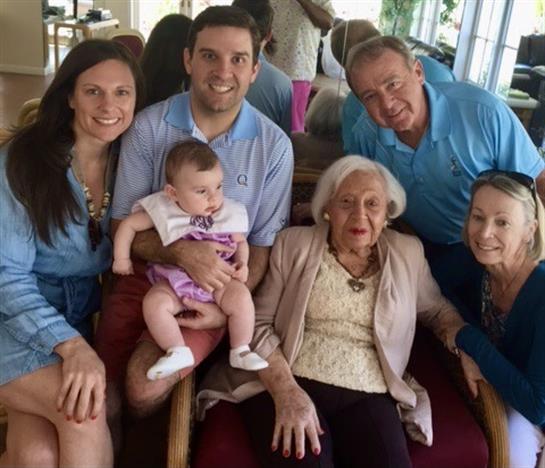 A cheerful family enjoys time together, highlighting connections across generations and love.