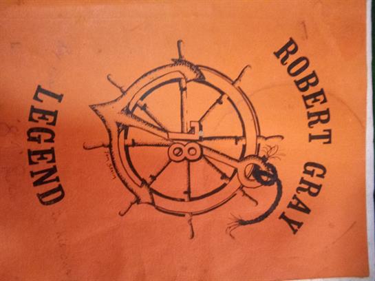 An artistic representation highlights the maritime history of Robert Gray, featuring a compass.