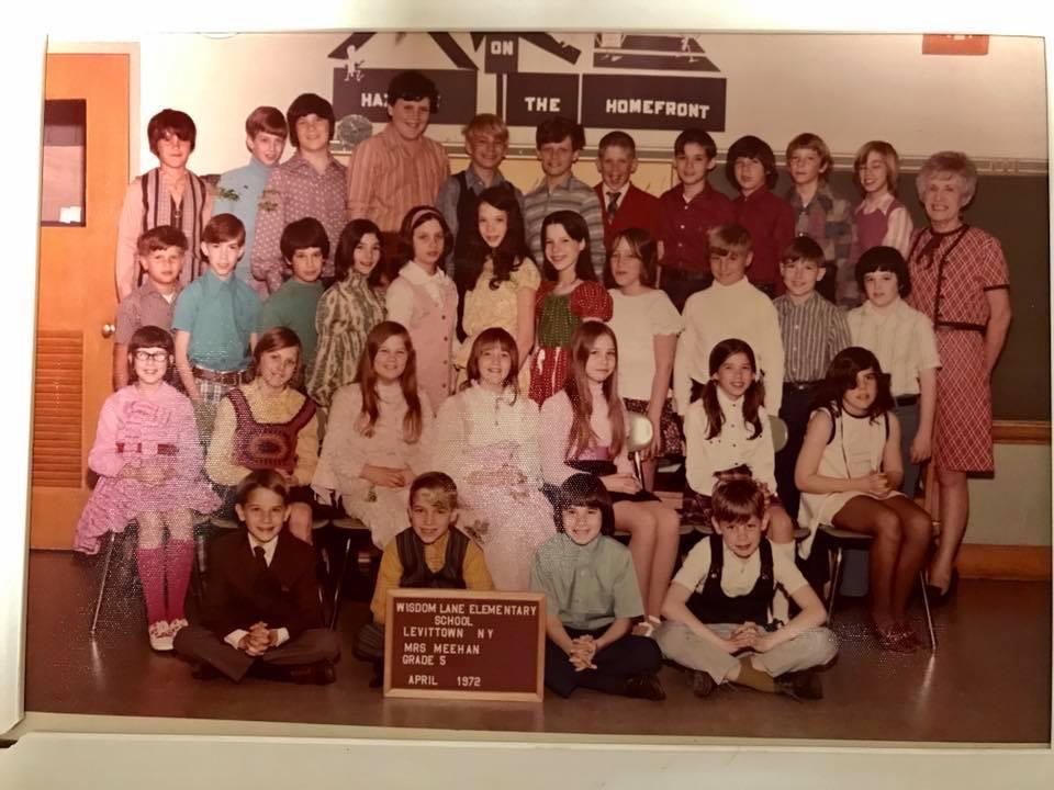 A group of children posing for a photo