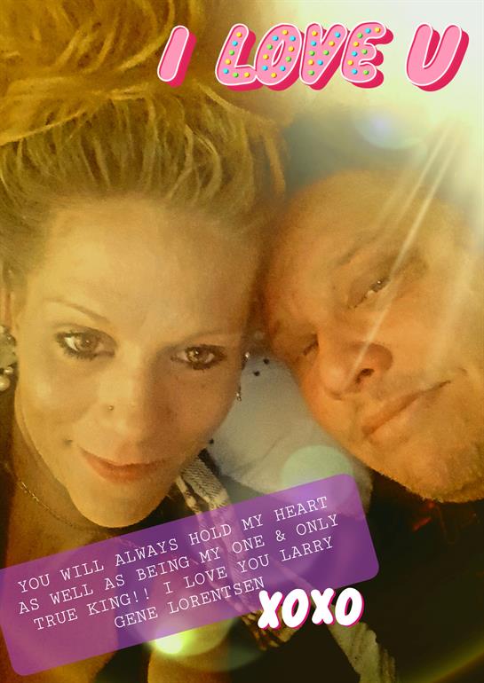 Two individuals pose closely together, smiling warmly under bright sunlight, celebrating their bond.