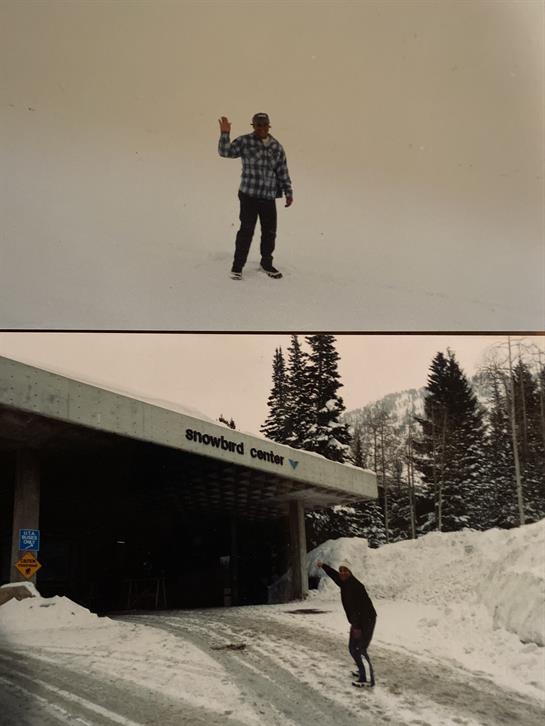Two individuals interact in a snowy mountain environment, showcasing winter fun and scenic beauty.