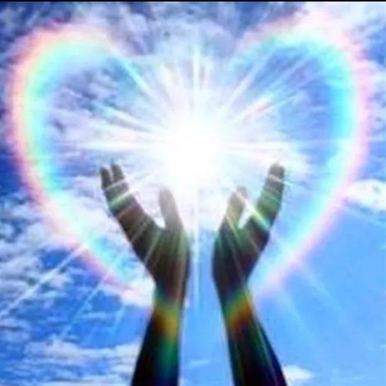 Two hands are uplifted towards a radiant light, forming a heart shape in the blue sky.