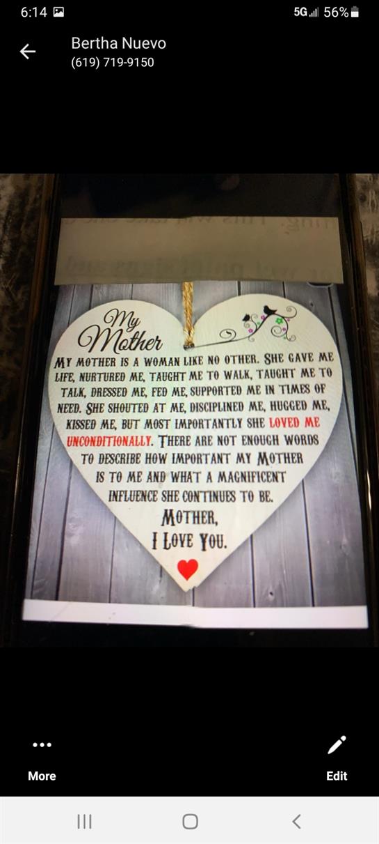 A heart-shaped sign symbolizes deep love and gratitude for a mother's care.