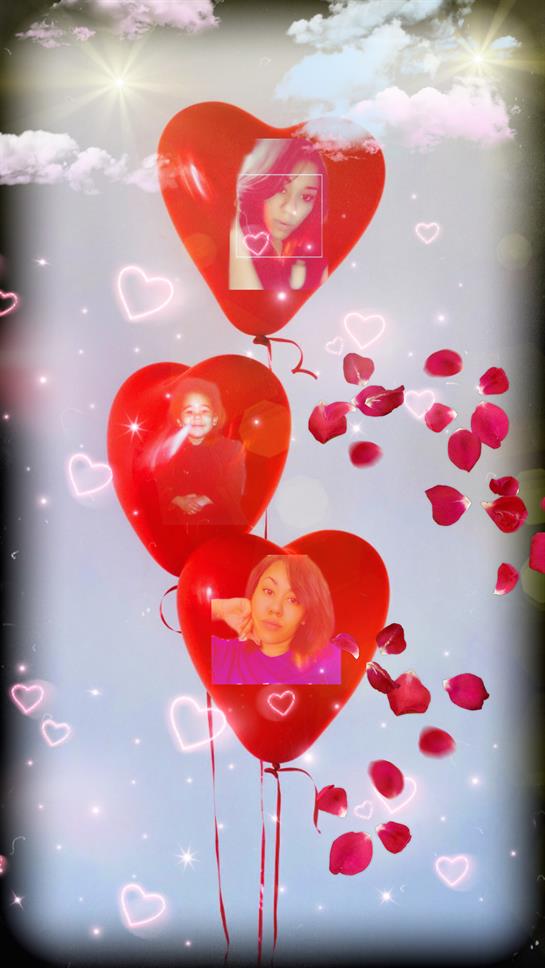 Three heart-shaped balloons show images, surrounded by falling rose petals in a joyful scene.