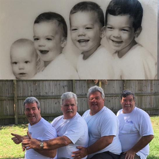 Four brothers recreate a childhood photograph in a backyard, showcasing their bond and fun.