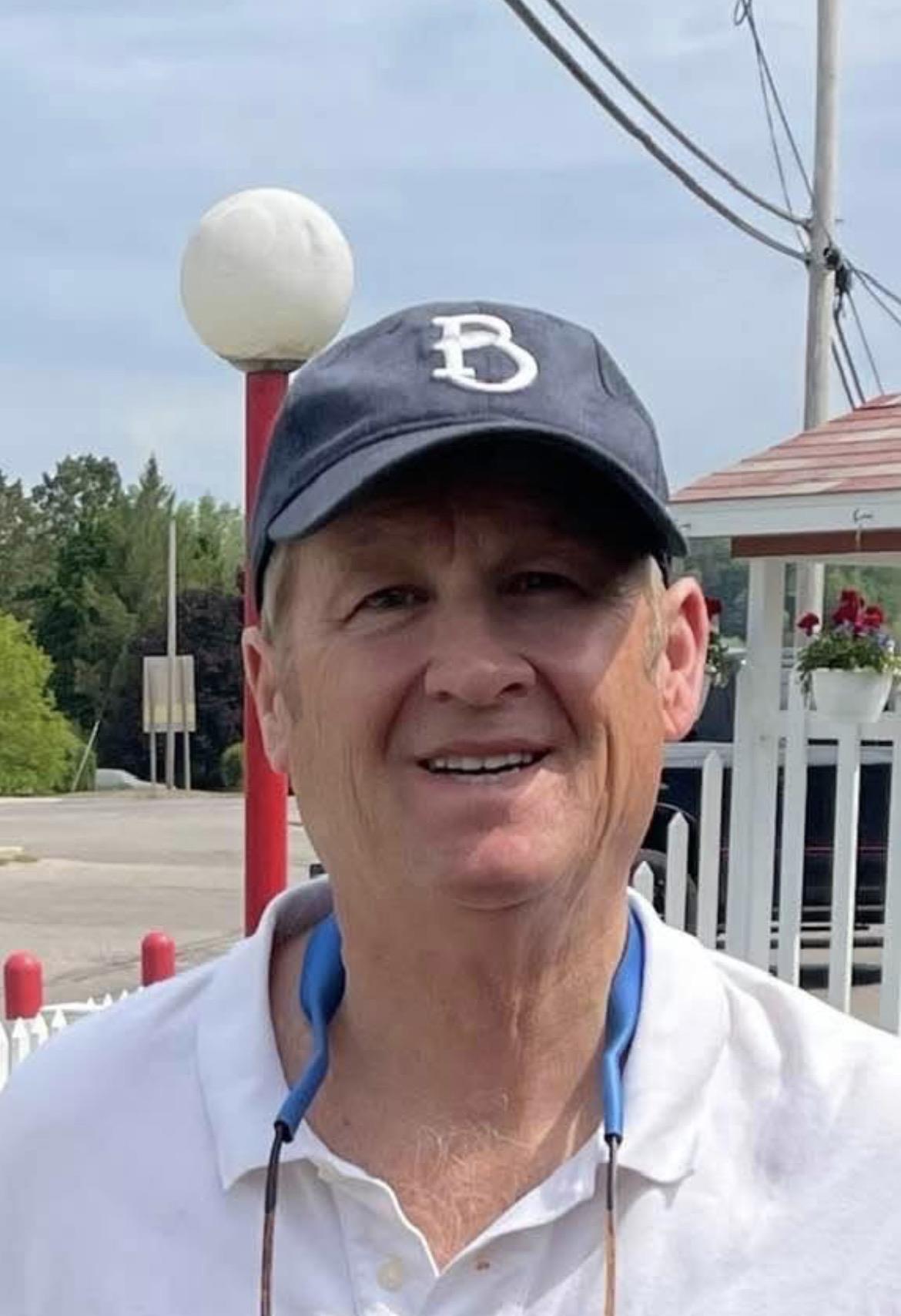 A man wearing a baseball hat