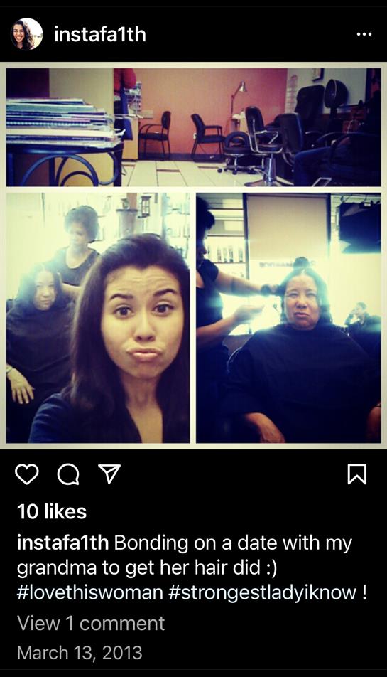 Two women in a salon, one taking a fun selfie while the other sits in a stylist's chair.
