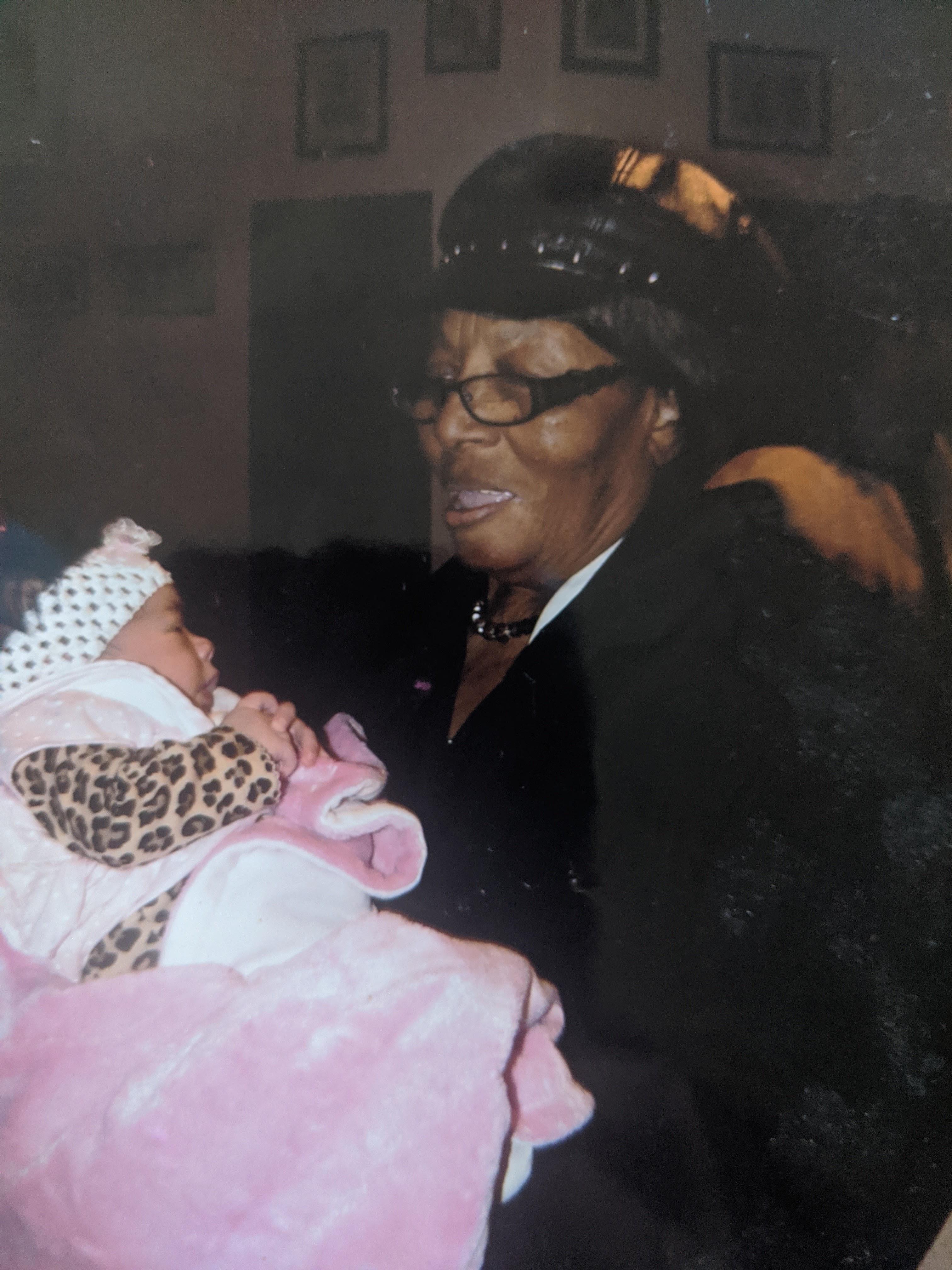 A woman holding a baby