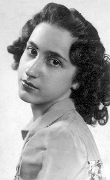 Portrait captures a young woman with curly hair and a thoughtful expression, posing elegantly.