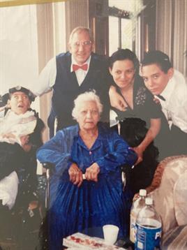 A close-knit family enjoys a memorable gathering, celebrating life and unity together in comfort.