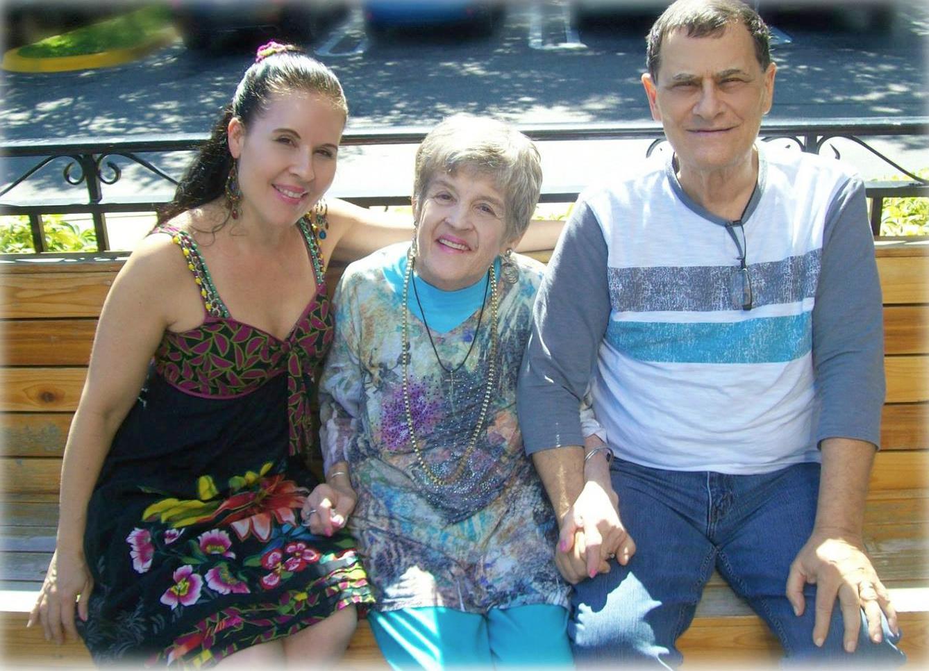 A group of people sitting on a bench