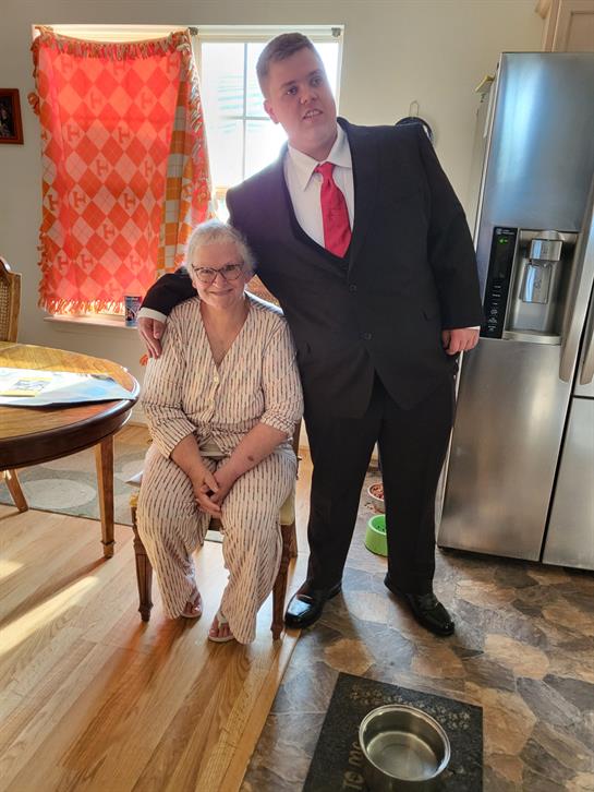 Family members share a cheerful moment in a cozy home, capturing joy and connection.