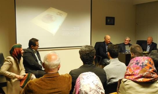 Professionals engage in a conversation about preserving cultural heritage during a panel event.