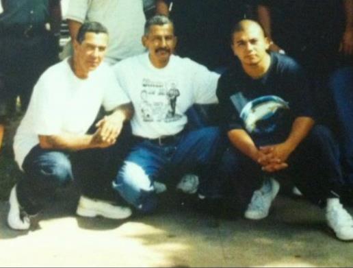 A group of men posing for a picture