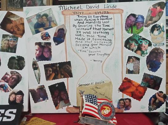 A tribute poster showcases personal photos, memories, and notes honoring Michael David Linde.