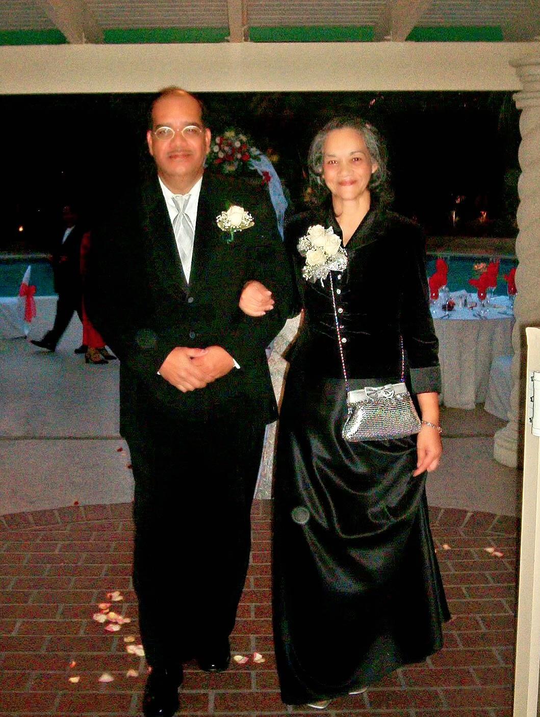 A man and woman in formal attire