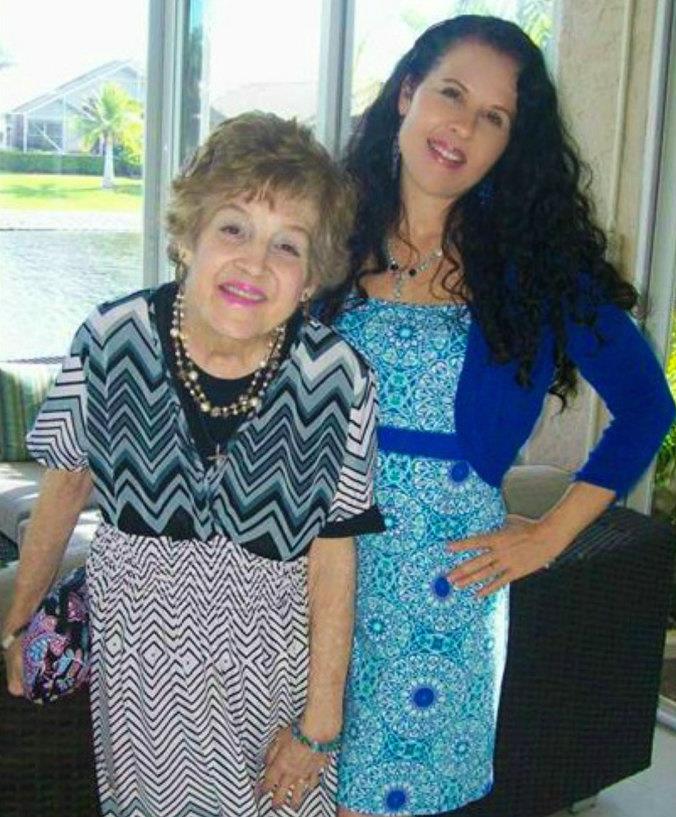 Two women standing next to each other