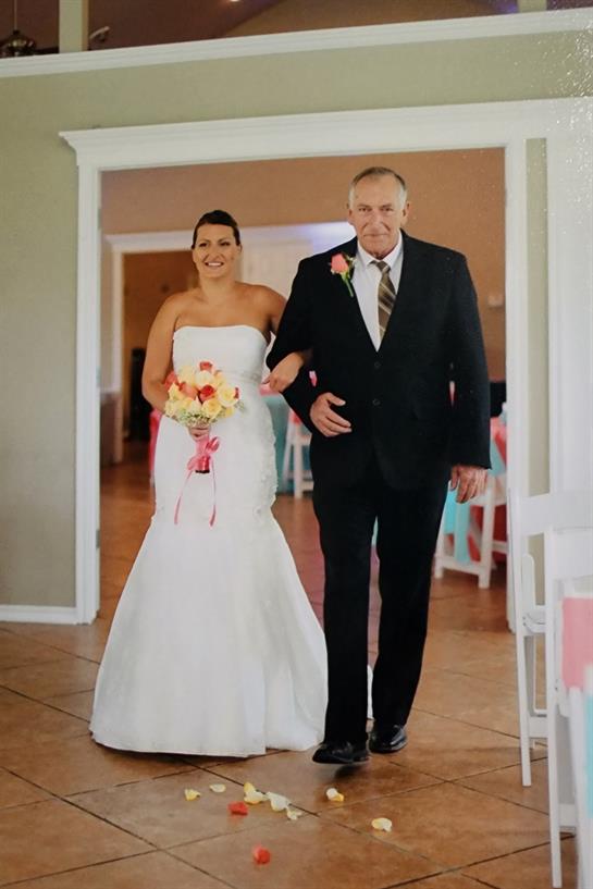 Celebration features a bride in a white gown walking down the aisle with her father by her side.