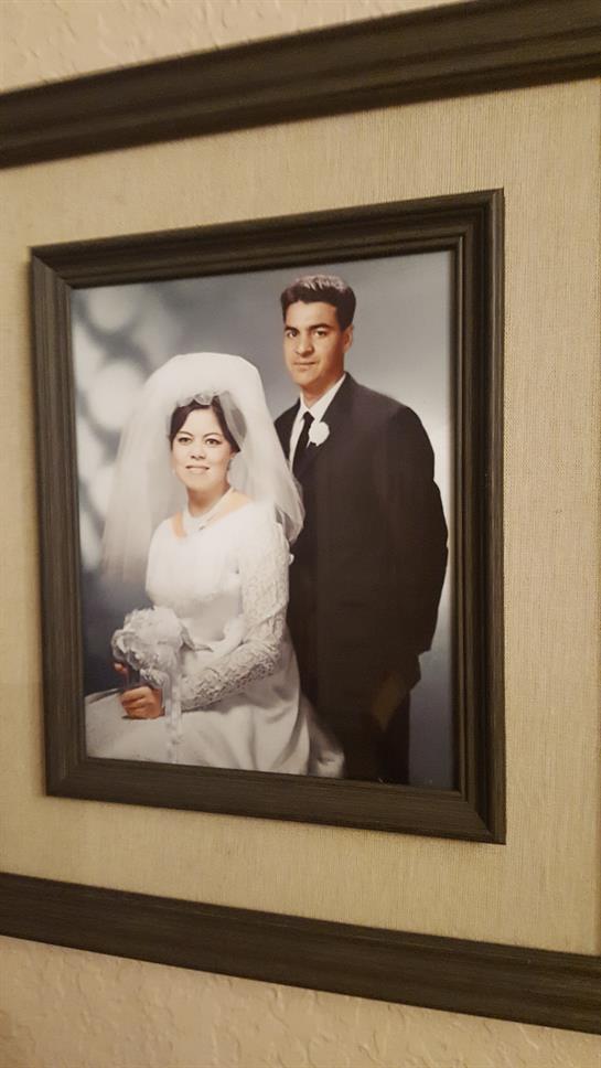 A framed picture of a man and woman