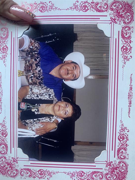 A man and woman in cowboy hats