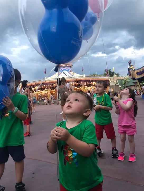 A child holding a balloon
