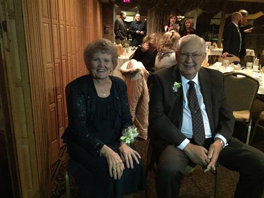 A man and woman sitting in chairs