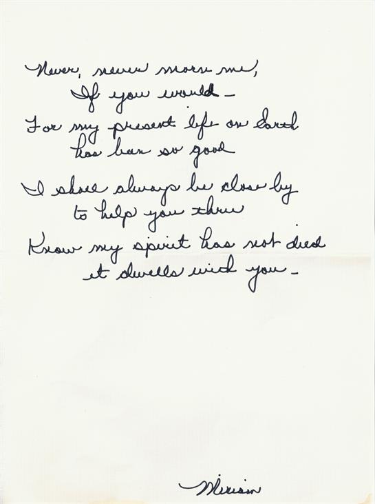A handwritten letter on a white paper