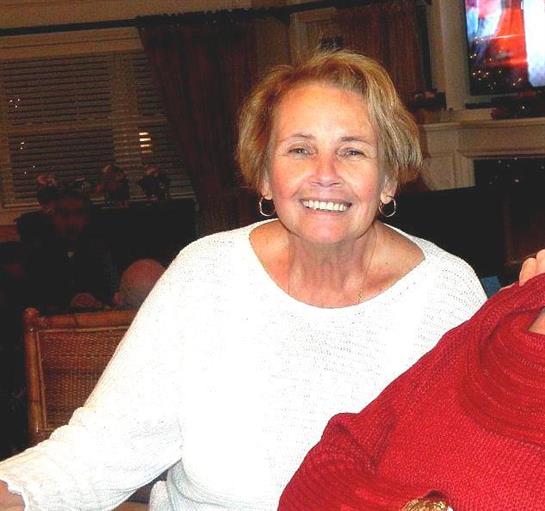 A woman smiling at camera