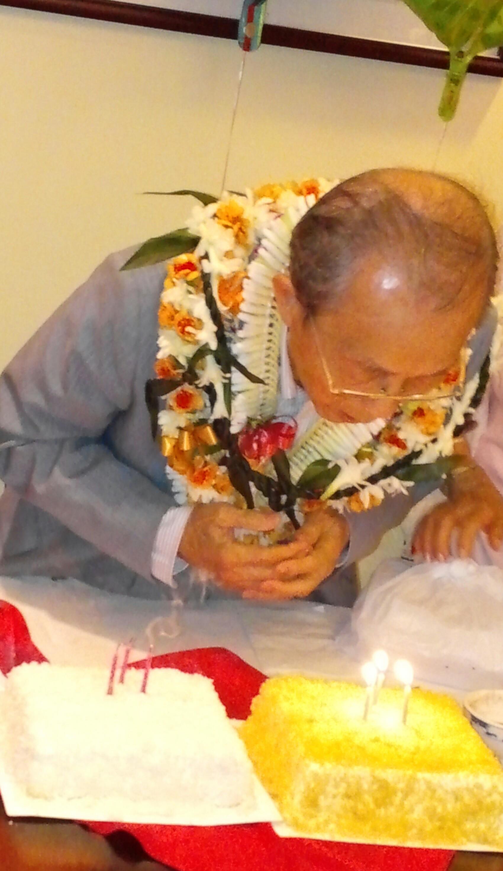 A man wearing a flower lei