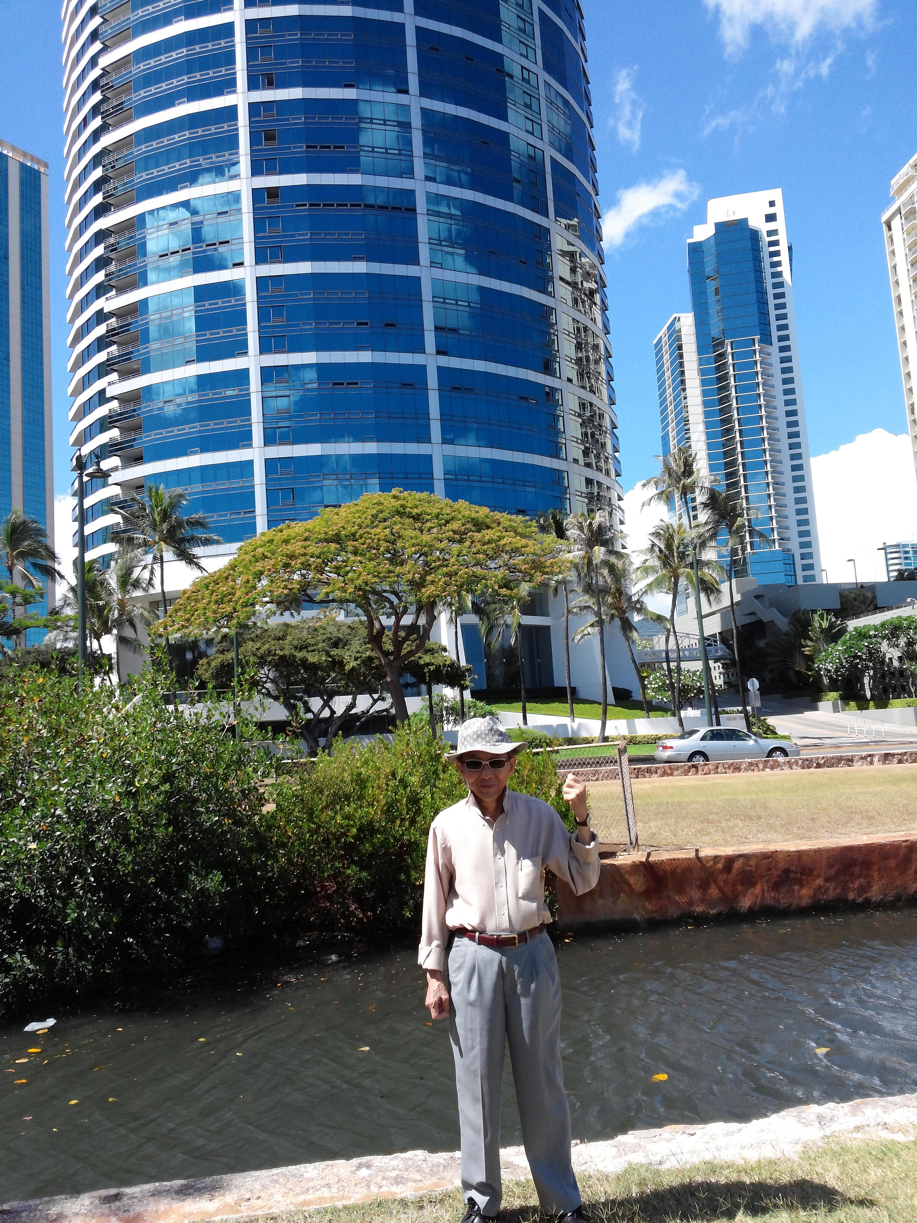 A man standing in front of a building