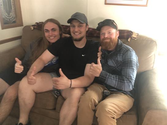 A group of people sitting on a couch