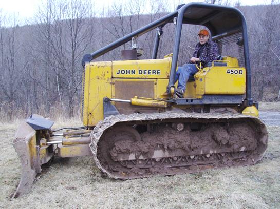 A man driving a bulldozer