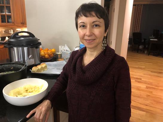 A woman smiling at camera