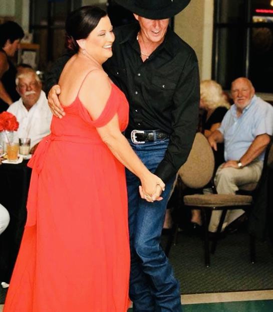 Guests enjoy a lively evening of dancing and celebration while laughing and socializing together.