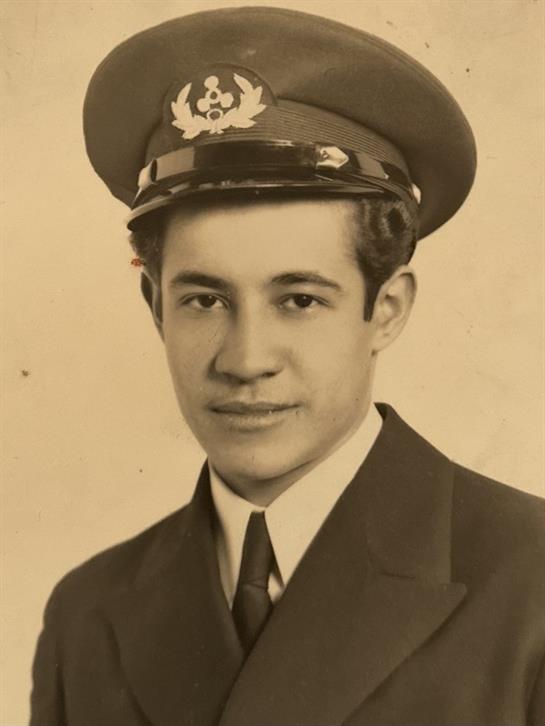 A man in a uniform and hat