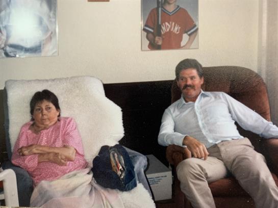 A man and woman sitting in chairs
