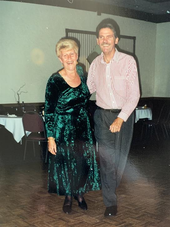 A man and woman standing together