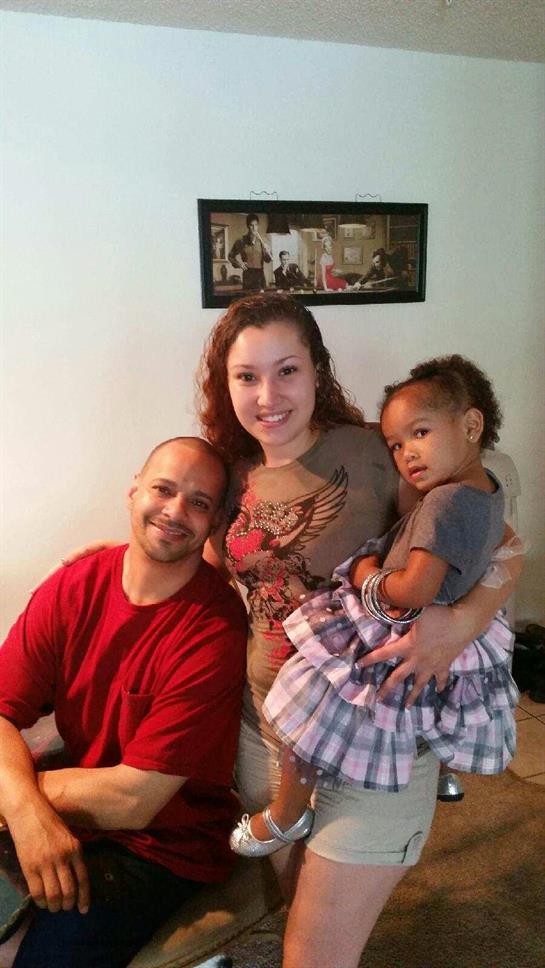 A family enjoys quality time together in a comfortable living space, showcasing love and connection.