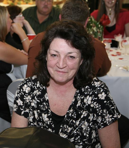 A woman sitting at a table